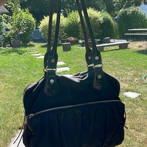 MZ Wallace black bag with red interior
